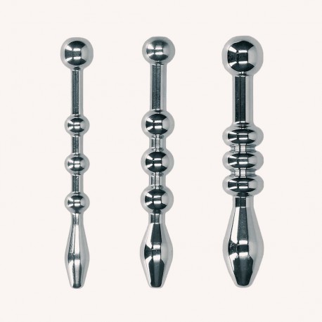 Plug urétral en métal solide à trois sondes pour un jeu BDSM médical intense.